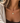 Collier Nayara porté, médaillon rond en nacre blanche et contour doré ajouré, photo naturelle