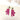 Boucles Basil de Fabien Ajzenberg en acétate fuchsia et éléments dorés, aux nuances vives.